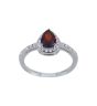 Rhodium plated sterling Silver ring with Clear and Garnet cubic zirconia stones.