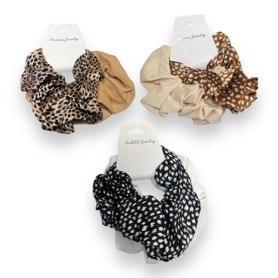 Satin and cotton feel scrunchies in animal print and in plain designs.

