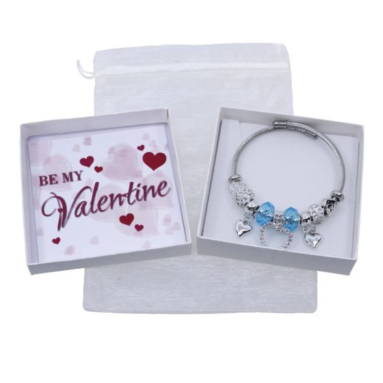 Boxed valentines day charm bracelet gift set.
Set includes a Rhodium colour plated heart design charm bangle decorated with genuine clear crystal stones.
