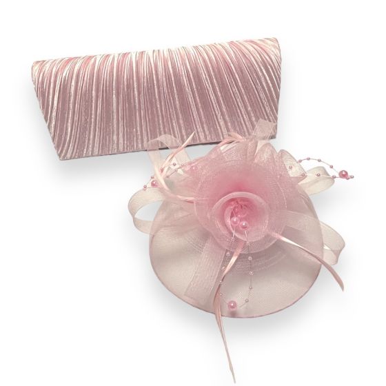 Ladies beautiful Babby pink satin pleated evening bag with chain shoulder strap in rhodium colour plating  with matching  coloured Fascinator with pretty Feather and bead detail .

We have done the work for you be teaming up this gorgeous set great fot 