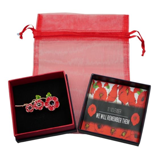 Rhodium or gold colour plated poppy brooch with Red and Green enamel, genuine Clear and Jet crystal stones.
Presented in a Navy and Red card gift box in a Red organza drawstring bag,
Available in a choice of colours.