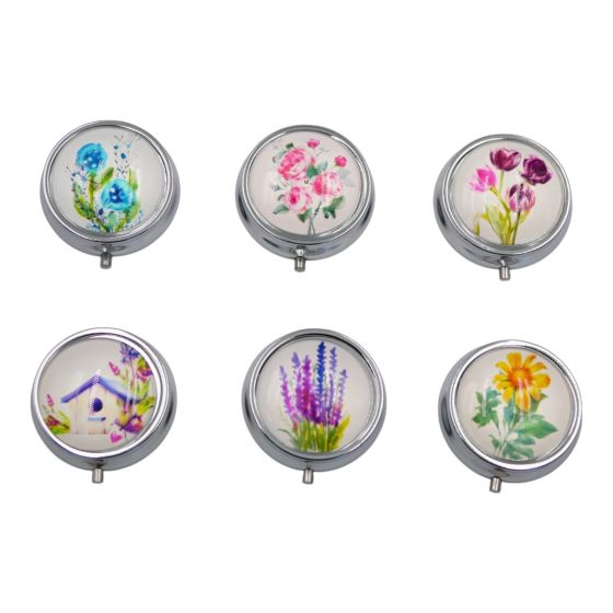 Flower pill box in 6 assorted designs .
Measuring approx.  4.5cm in diameter. 
Sold as a pack of 6 assorted.