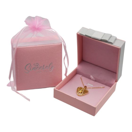 Ladies boxed Gold colour plated angel wings and heart design pendant with genuine Clear crystal stones.
