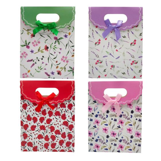 Floral design gift bags with a satin bow and velcro fastening.
In 4 assorted designs and colours.
