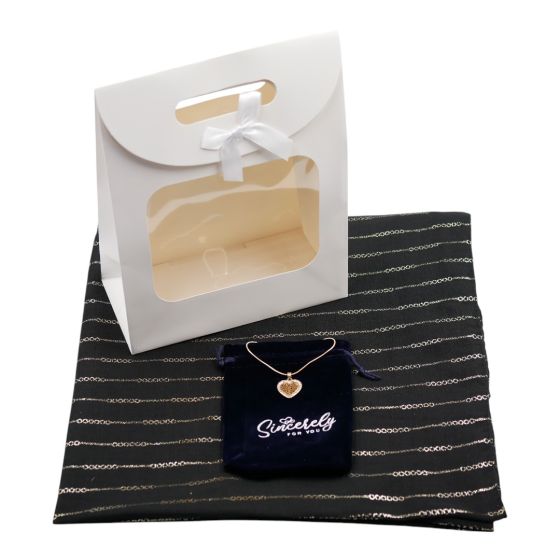 Ladies complete gift set includes a Black/Gold colour foil chain print scarf, Gold colour plated Tree of Life heart pendant with genuine crystal stones, a Navy velvet drawstring gift pouch and a White card gift bag with a clear window and a velcro fasteni