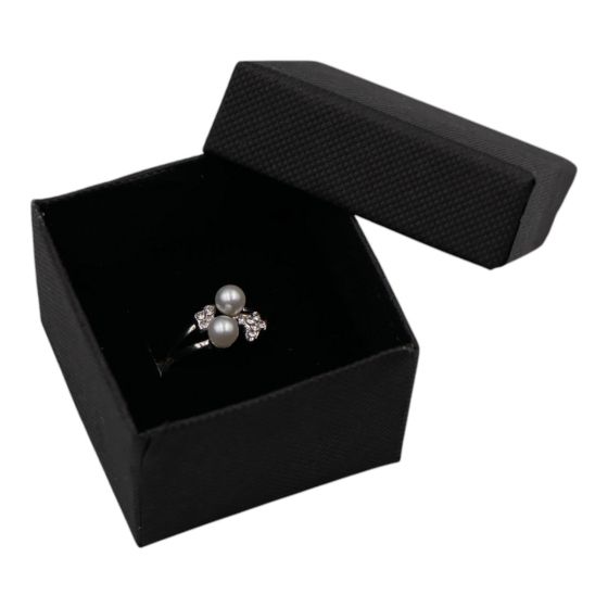 Black card box with Black flock coated foam inner.
Suitable for rings and small stud earrings.Outer edge of box measures approximately 5cm x 5cm x 3.5cm.


*Ring not included.