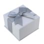 Leatherette card universal box with a Grey flock coated foam inner and Silver satin ribbon bow. 
Outer edge of box measures approx. 7cm x 7cm x 4.5cm
Usable space 6.5cm x 6.5cm x 4cm.
Pack of 12. 
***Jewellery not included***