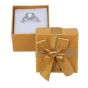 Metallic sheen card ring box with a satin ribbon bow and a White flock coated foam inner. 
In assorted colours of Red, Gold, Blue, Light Pink, Fuchsia and Lilac
Outer edge of box measures approx. 5cm x 5cm x 3.8cm.
Usable space 4.5cm x 4.5cm x 3.5
Pac