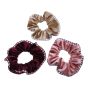Velvet scrunchies decorated with a houndstooth trim.
