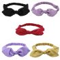 Elasticated, soft cotton feel plain kylie bands decorated with a bow ladies headbands
