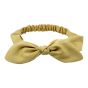 Elasticated, soft cotton feel plain kylie bands decorated with a bow ladies headbands