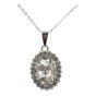 Rhodium colour plated oval design pendant with genuine crystal stones
