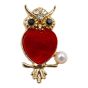 Owl design brooch with genuine Jet and Clear crystal stones, a imitation pearl and imitation mother of pearl.