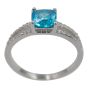 Rhodium plated sterling Silver ring with Clear and Blue Topaz cubic zirconia stones.