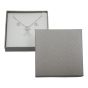 Slim line textured Silver card universal box with a White velvet covered foam insert.
