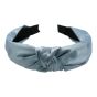 Wide polka dot satin alice band with a centered knot.