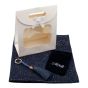 Ladies complete gift set includes a Navy/Gold colour foil speckle scarf, Navy/Gold colour plated bag charm with genuine Sapphire crystal stones, a Navy velvet drawstring gift pouch and a White card gift bag with a clear window and a velcro fastening.
