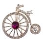 Venetti collection, Rose Gold colour plated penny farthing design brooch with genuine Clear and Fuchsia crystal stones.
