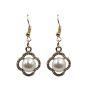 Gold colour plated diamante drop earrings with imitation pearl.
Measuring approx. 4.5cm.
Presented on a display card in a clear bag with a hole for easy display.