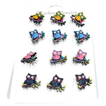 Ladies enamel  owl  brooches in assorted colours.
owl is sat on on an enamelled branch .
