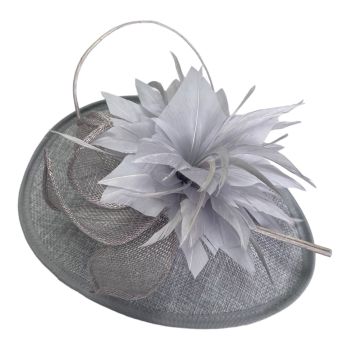 Grey soft sinamay concord fascinator decorated with feathers and a quill.

