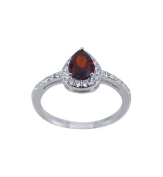 Rhodium plated sterling Silver ring with Clear and Garnet cubic zirconia stones.