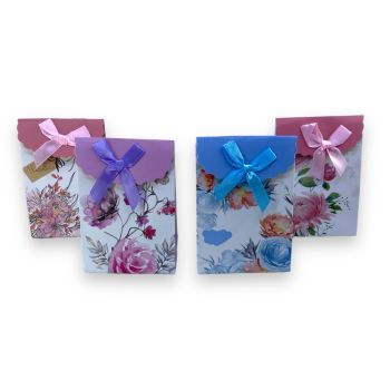 Small size paper gift bag with velcro fastner and ribbon detail.

Sold as a pack of 12 assorted 

Discount available in quantities

Size approx 7.5x 10.5 x 4 cm