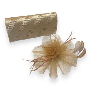 We have done the work for you by teaming up this lovely pleated satin evening bag with a magnetic fastner and rhodium colour plated chain shoulder strap with a matching light gold colour fascinator on a concord clip.

Perfect for that special occasion .