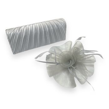 Ladies beautiful Silver Grey satin pleated evening bag with chain shoulder strap in rhodium colour plating  with matching Fascinator.

We have done the work for you be teaming up this gorgeous set great fot that special occasion .

Items can also be b