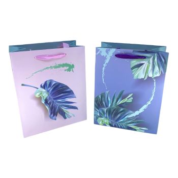 leaf design paper gift bag with glitter detail and satin ribbon handle in baby pink lilac and turquoise 