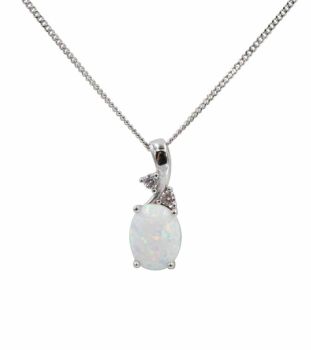 Rhodium plated sterling Silver pendant with synthetic White opal and Clear cubic zirconia stones.
