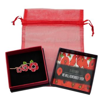 Rhodium or gold colour plated poppy brooch with Red and Green enamel, genuine Clear and Jet crystal stones.
Presented in a Navy and Red card gift box in a Red organza drawstring bag,
Available in a choice of colours.