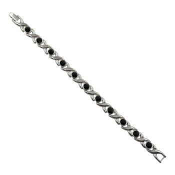 Rhodium colour plated magnetic bracelet with faceted glass stones.
