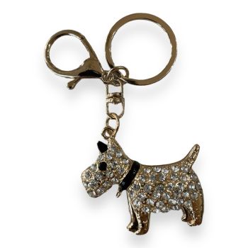 Scottie Dog shaped bag charm available in Rhodium colour plating and  Gold Colour plating ,embelished with genuine crystal stones and enamel detail.

Sold as a pack of 3 per colour or 4 assorted .

Size approx  Dog     5 .5x 4.5cm total size 9.5