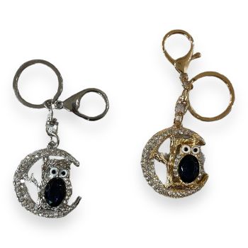Leopard bag charm embeleshed with genuine crystal stones and enamel detail .

Available in Gold or Rhodium colour plating .

sold as a pack of 3 per colour or 4 assorted .

size approx .Leopard  9.5 x 3 cm ,Total size 12 cm.